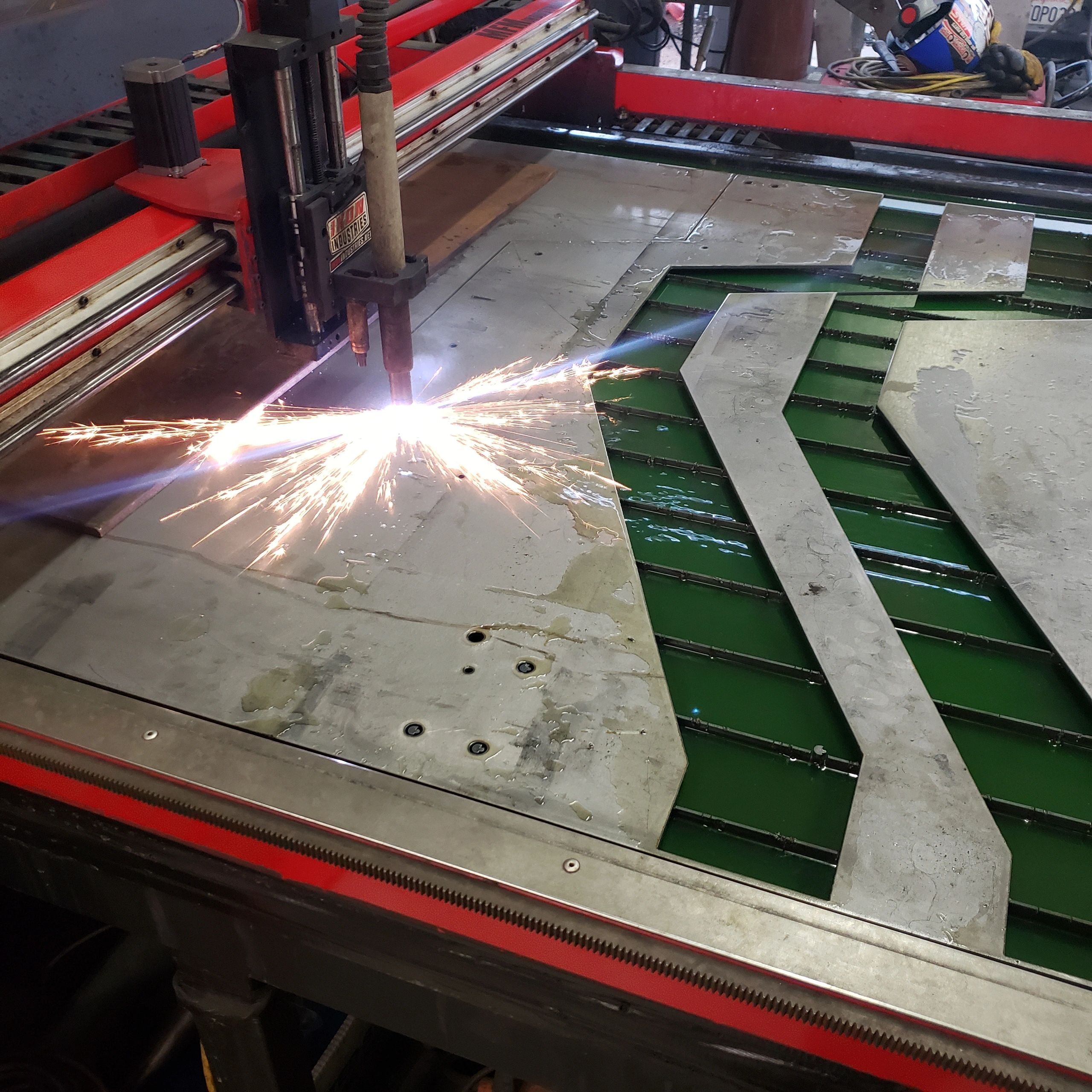 CNC plasma cut frame rails custom chassis Ikon Industries Ontario CA